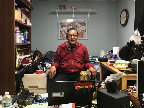 Pastor Tim Park sits in his office at Glory Church of Jesus Christ, where he records his weekly radio program.