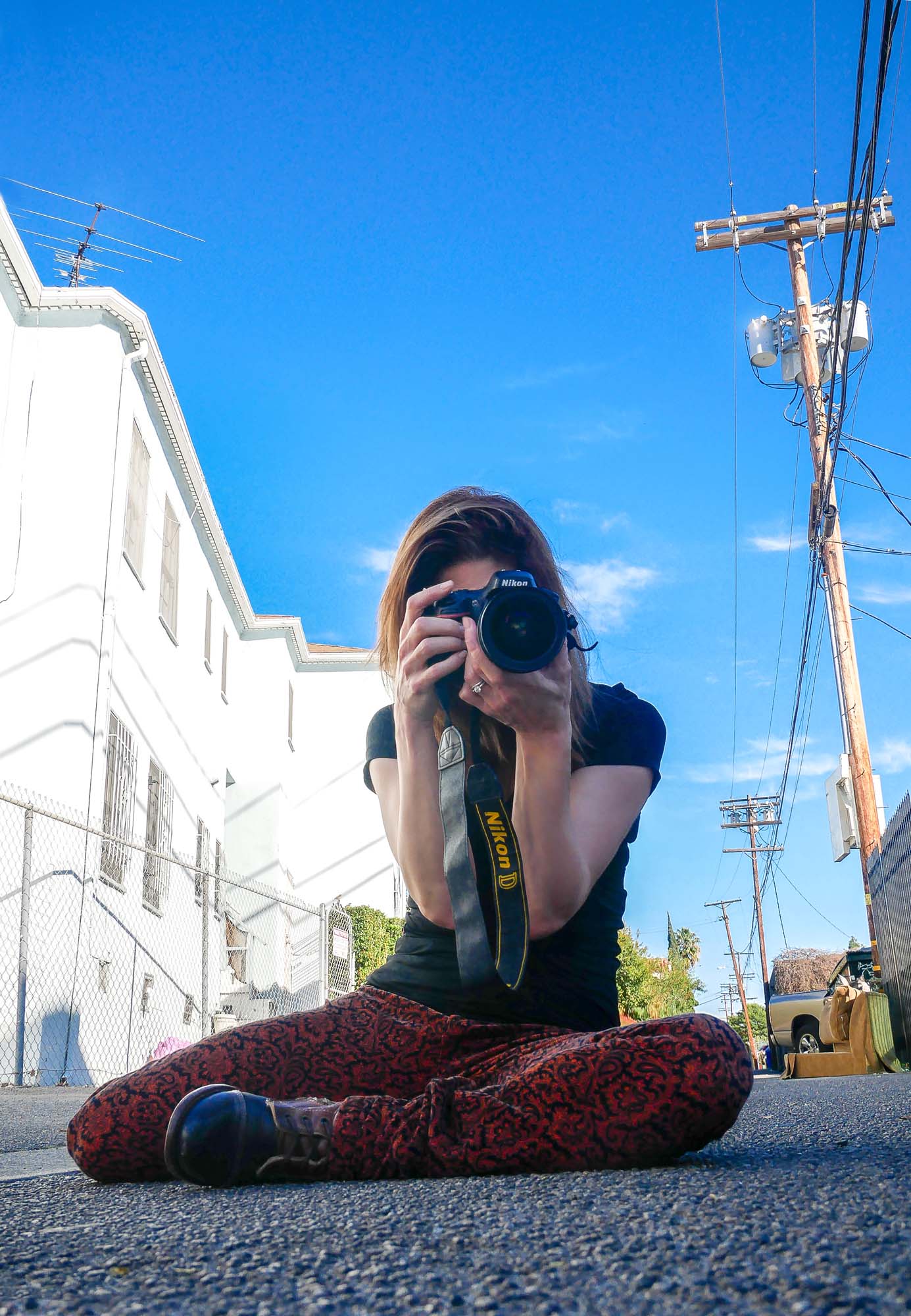 “My paparazzi is sexier than your paparazzi.” Here is my photographer friend, Jessica Sherman taking some photos of me (while I am taking some photos of her) in an alley behind Third Street. She is a professional portrait and entertainment photographer.