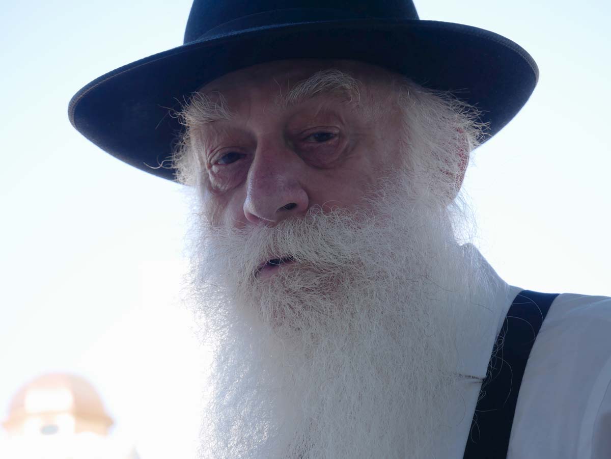 I was sitting on a bench on La Brea Ave at the beginning of Sukkot when my friend, Boris/Burach, stopped by to chat with me. As we were talking, I took out my camera and asked if I could take a picture of him. He said of course.