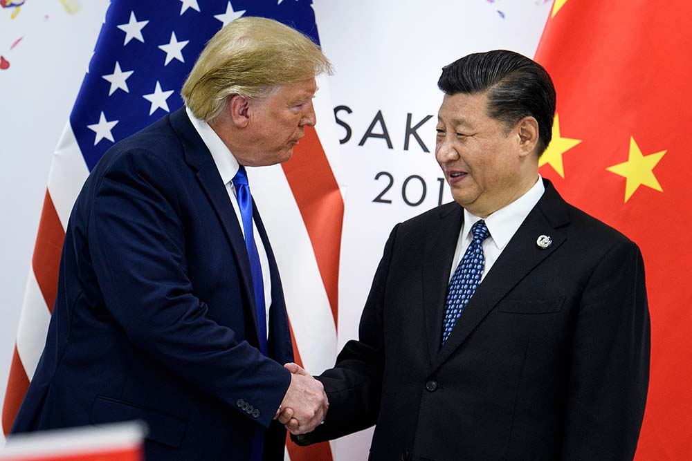 China's President Xi Jinping shakes hands with US President Donald Trump before a bilateral meeting on the sidelines of the G20 Summit in Osaka in July 2018.