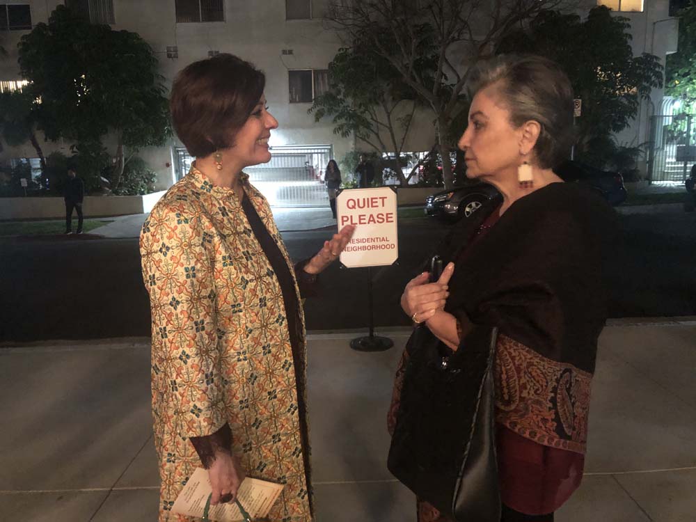 Homa Sarshar and her radio show collaborator, Mandana Zandian, outside the Wilshire Ebell Theatre in Los Angeles. Sarshar lent her voice to narration for a stage production earlier this year.
