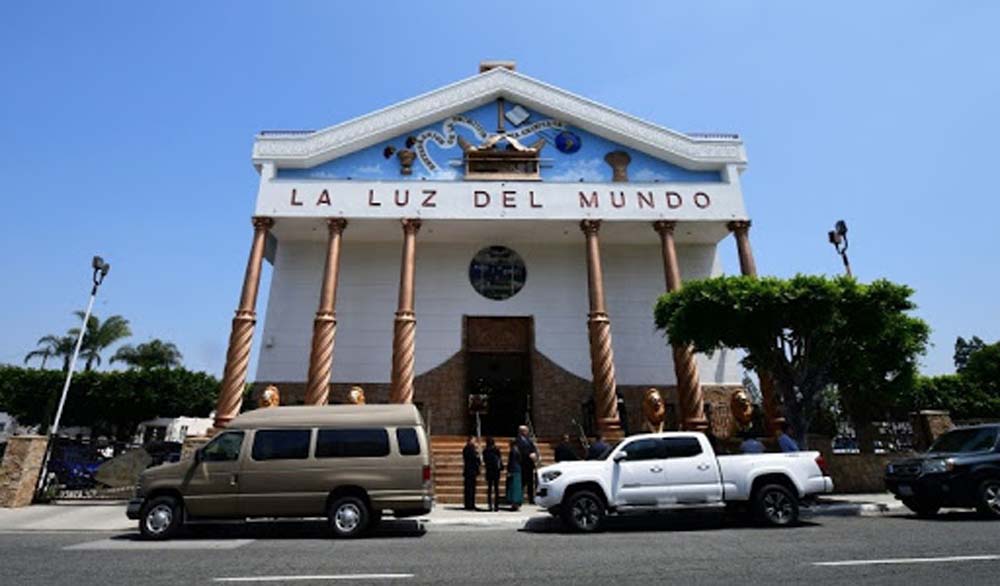 People congregate in front of the La Luz Del Mundo (The Light of the World) Church in Los Angeles.