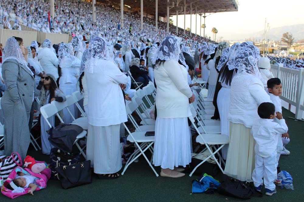 About 10,000 members of La Luz Del Mundo gathered in February at the Pomona Fairplex to celebrate the U.S. version of the religious group's annual Holy Supper ritual. Men sat on one side of the grandstand, women and children on the other.