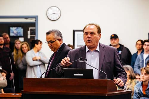 Santa Ana Unified School District Deputy Superintendent Alfonso Jimenez (left) and Ralph Opacic, OCSA's Executive Director, stood beside each other at a Feb. 5 meeting of the Orange County Board of Education in Costa Mesa.