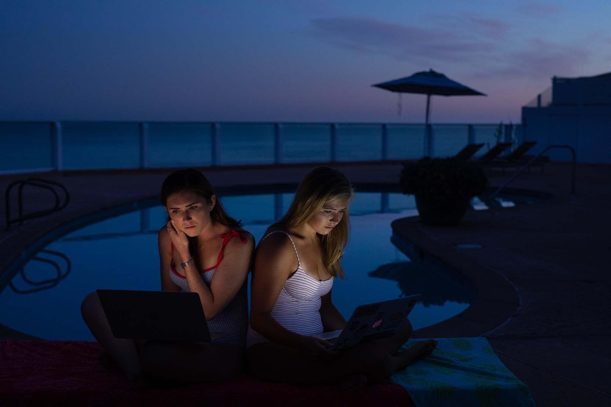 The Rener sisters are both graduating seniors: Emmy (left) from Palos Verdes High School, and Hannah (right) from Pepperdine University. They've retreated to a seaside home to make the best of the quarantine as they complete their coursework.