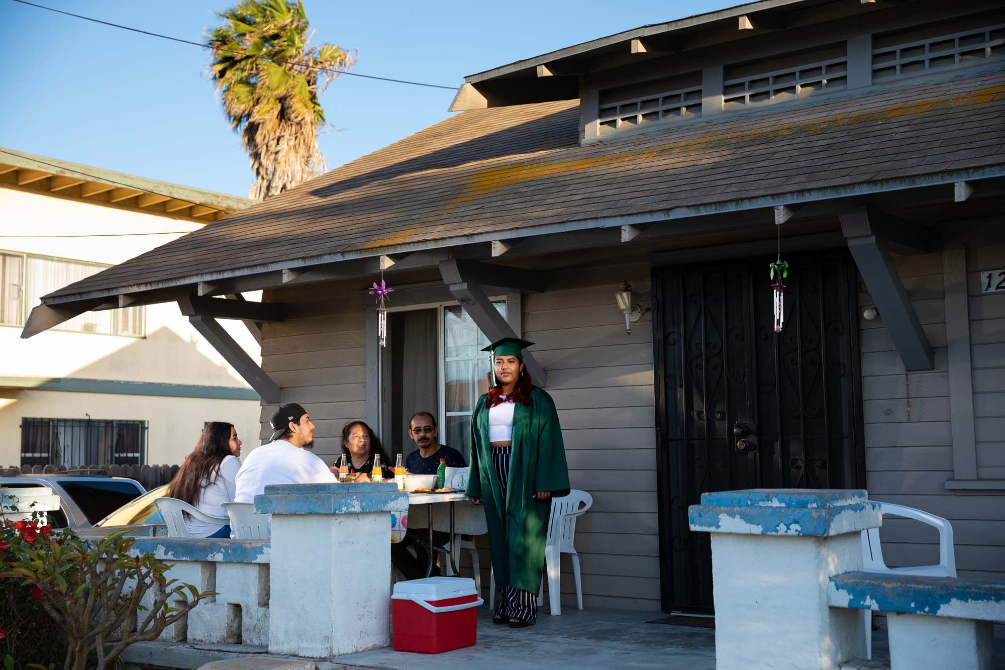 Leslie Ramirez and her family celebrate her graduation from Hamilton High School's Humanities Magnet at their home in South L.A. She said, 'I'm first-generation. My parents come from Guatemala, my grandparents as well. They came here for us to have a better future. Graduating high school is a big milestone.'